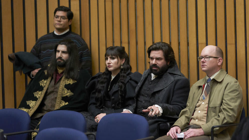 Guillermo (Harvey Guillén), Nandor (Kayvan Novak), Nadja (Natasia Demetriou), Laszlo (Matt Berry), and Colin Robinson (Mark Proksch) at a city council meeting.